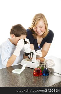 School children working together on a science project. White background.