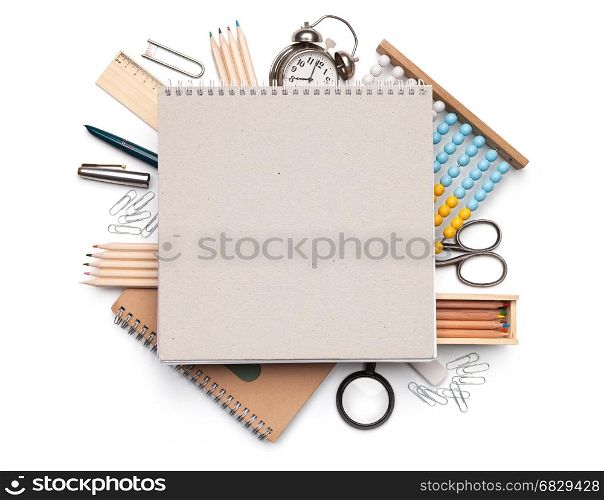 School concept. Blank notebook over vintage school supplies isolated on white background. Top view