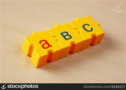 School cubes with letters on the table