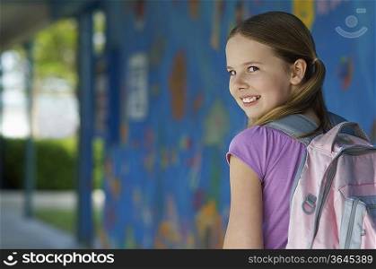 School girl outside school