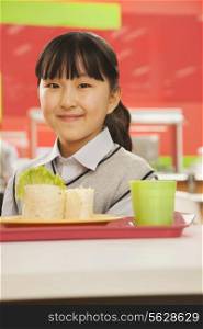 School girl portrait in school cafeteria