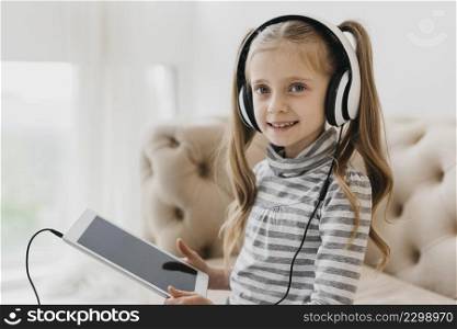 school girl wearing headphones virtual courses