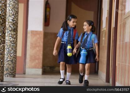 School girls walking together