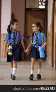 School girls walking together