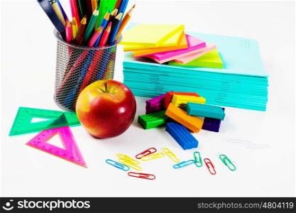 School stationary. Colored pencils plasticine papers and other school items