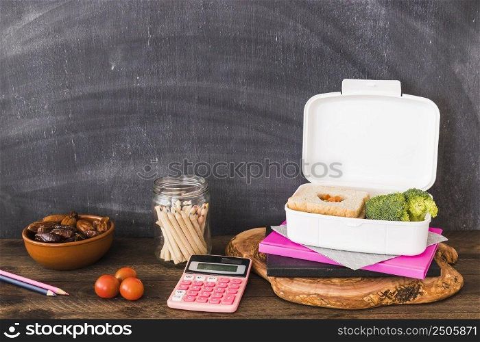 school stuff food near blackboard