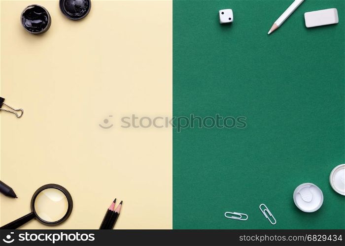 School Supplies on yellow and green background. Flat lay. Minimal style. Copy space. Top view