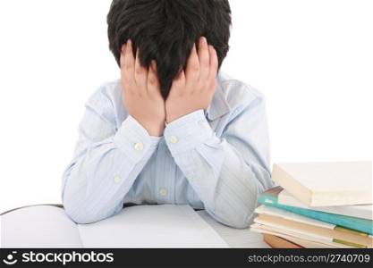 Schoolboy being stressed by his homework, isolated on white background