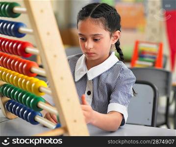 Schoolgirl Using an Abacus