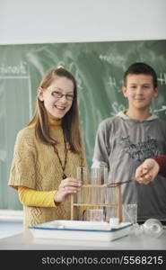 science and chemistry classees at school with smart children and teacher