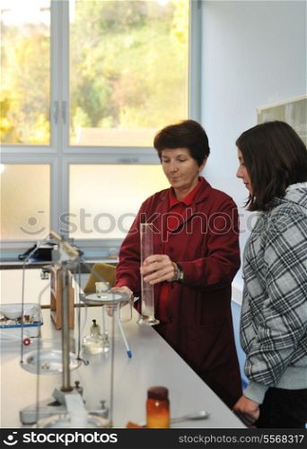 science and chemistry classees at school with smart children and teacher