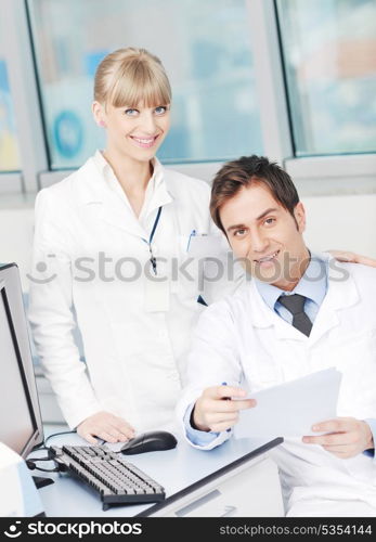 science and research biology chemistry an dmedicine youn people couple in bright modern lab