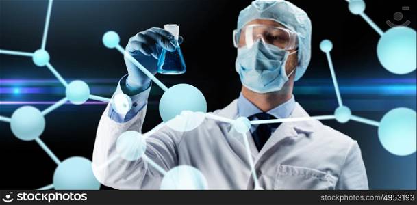 science, chemistry, research and people concept - young scientist in protective mask, hat and goggles holding test flask with chemical over dark background and molecule. scientist in mask holding flask with chemical