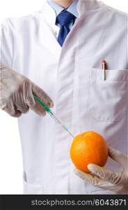 Science experiment with orange and syringe