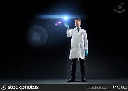 science, future technology and people concept - doctor or scientist in white coat and medical gloves with laser light over black background. doctor or scientist in lab coat with laser light. doctor or scientist in lab coat with laser light