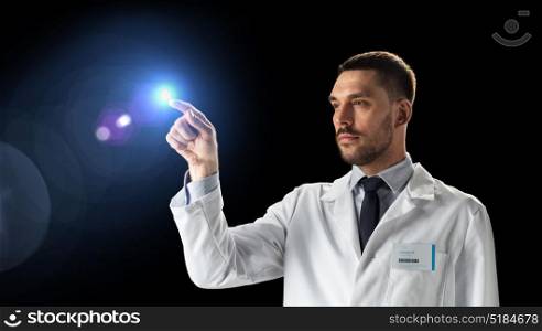 science, future technology and people concept - doctor or scientist in white coat with light over black background. doctor or scientist in white coat with light