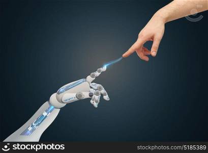 science, future technology and people concept - human and robot hands reaching to each other over blue background. human and robot hands reaching to each other