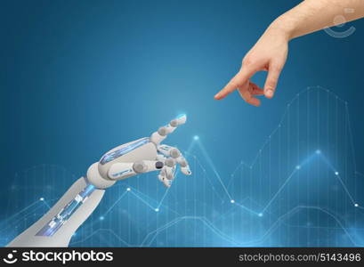 science, future technology and progress concept - human and robot hands reaching to each other. human and robot hands reaching to each other