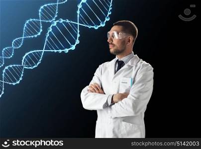science, genetics and people concept - male doctor or scientist in white coat and safety glasses with dna molecule over black background. scientist in lab coat and safety glasses with dna