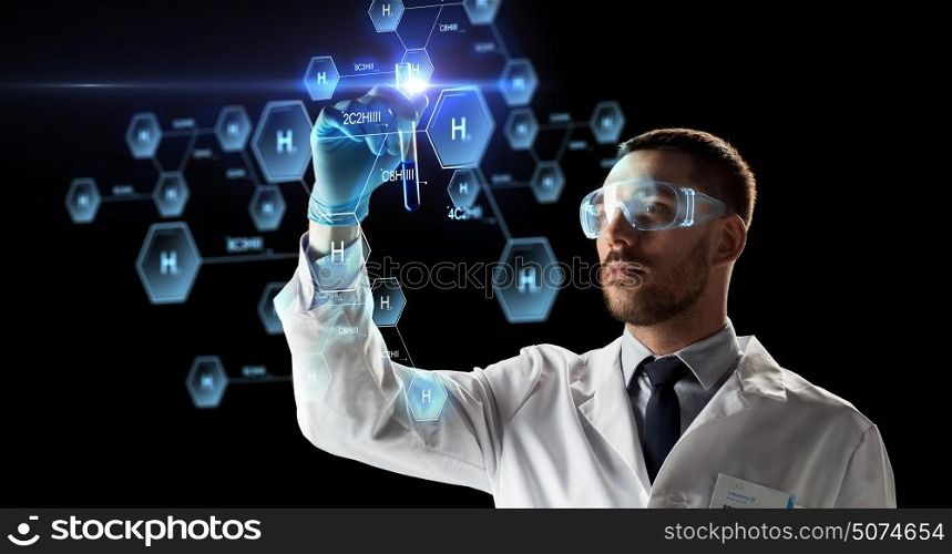 science, research and chemistry concept - young scientist in safety glasses with test tube and virtual projection of chemical formula. scientist with test tube and chemical formula