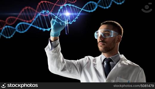 science, research and genetics concept - young scientist in safety glasses with test tube and virtual projection of dna molecule. scientist with test tube and dna molecule