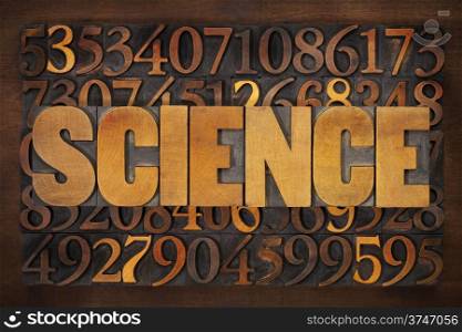 science word in vintage letterpress wood type against number background