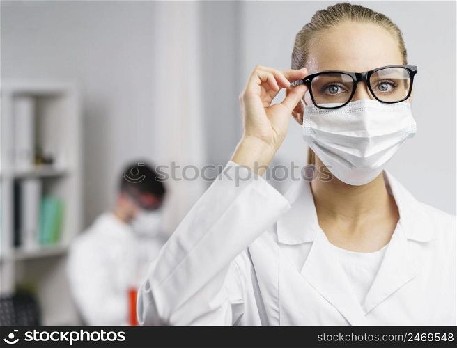 scientist laboratory with medical mask