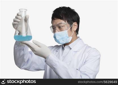 Scientist Looking at Beaker