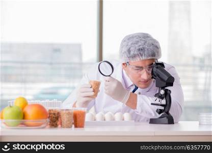 Scientist studying various food products