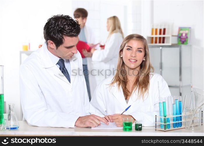 Scientists conducting experiments