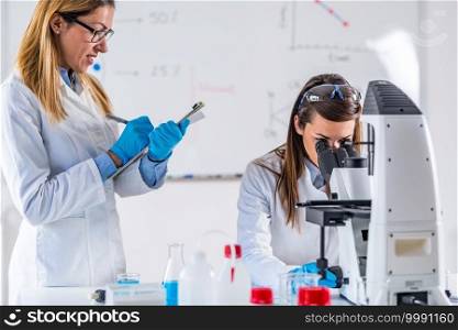 Scientists working in their lab