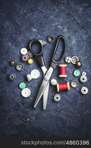 scissors and buttons. professional scissors for fabric and buttons from clothing