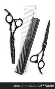 scissors and comb professional hairdresser on white background