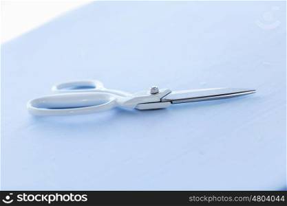 Scissors. Close up of scissors lying on table