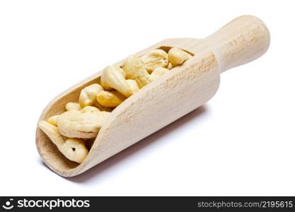 Scoop full of Roasted organic cashew nuts isolated on white background. Clipping path. Scoop full of Roasted cashew nuts isolated on white background. Clipping path