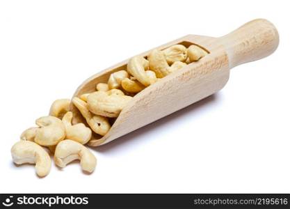 Scoop full of Roasted organic cashew nuts isolated on white background. Clipping path. Scoop full of Roasted cashew nuts isolated on white background. Clipping path