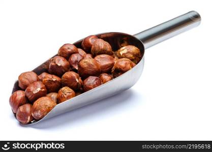 Scoop full of whole hazelnuts isolated on white background. Clipping path. Scoop full of hazelnuts isolated on white background. Clipping path
