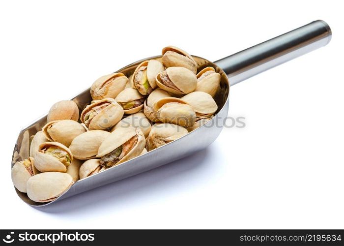 Scoop of Roasted organic pistachios nuts isolated on white background. Clipping path. Scoop of Roasted pistachios nuts isolated on white background. Clipping path