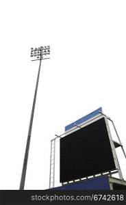 scoreboard in a stadium with a tall floodlight, isolated on white with clipping path in jpg.