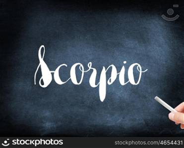 Scorpio written on a blackboard