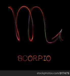 ""Scorpio",Zodiac sign from led light on black background. "