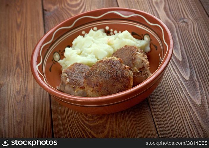 Scotch Collops.Scottish national dish of beef, herring and onions