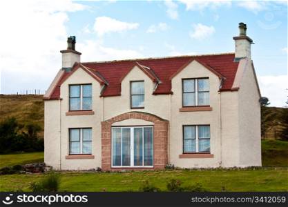 Scotland. Beutiful house in red and white colours.