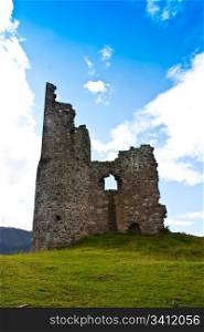 Scotland, Sutherland. Ruiner of a castle on blue sky.
