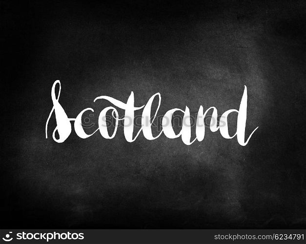 Scotland written on a blackboard
