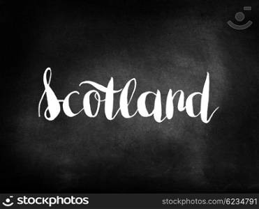 Scotland written on a blackboard