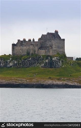 Scottish castle close to Oban, south Scotland, in a cloudy day