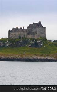 Scottish castle close to Oban, south Scotland, in a cloudy day