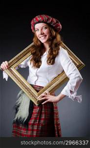 Scottish woman with frame on white