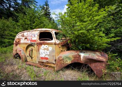 Scrap car at Birkenhead Lake near Pemberton British Columbia Canada